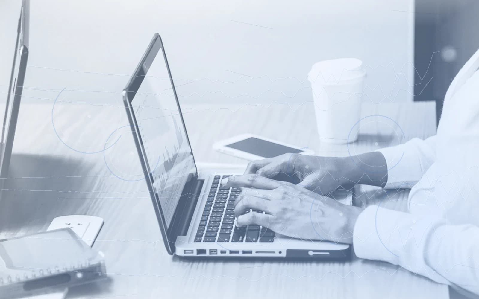 Editorial image for "Why Your Exit Plan Should Start Years Before the Exit". Source image: Woman working on a laptop.