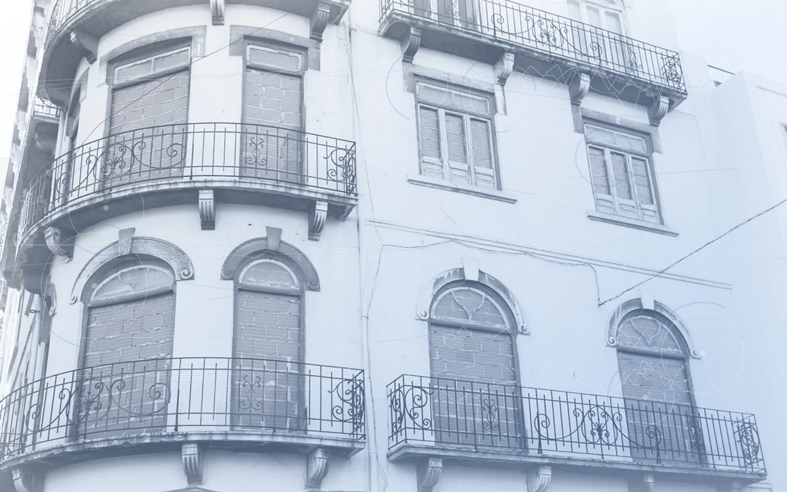 Editorial image for "Moving to Portugal With Wealth: The Questions to Ask Before You Arrive". Source image: Building in Lisbon.
